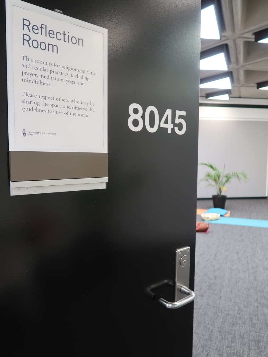 Door of the Reflection Room; yoga mat and plant inside