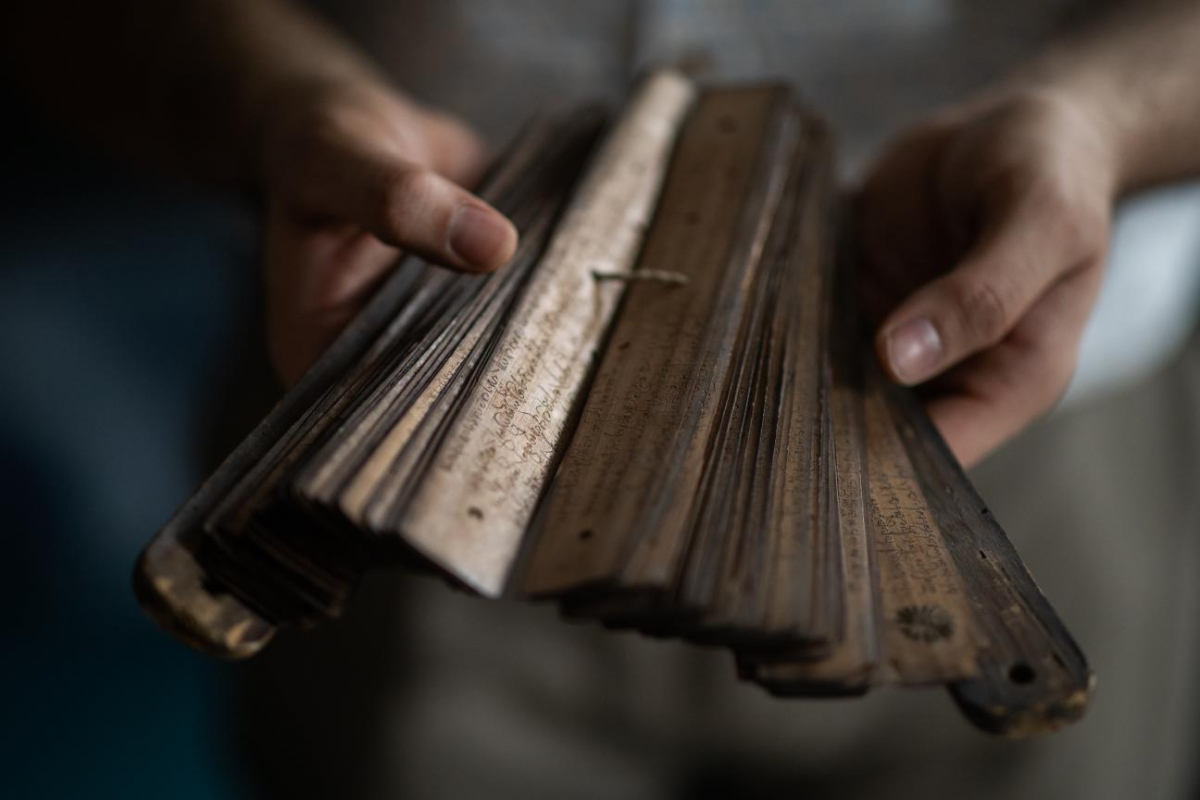 Close up shot of a palm leaf manuscript.